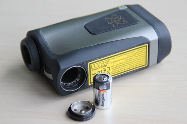 Nikon Laser 1000A S rangefinder with battery and lid.