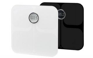 Fitbit Aria Wi-Fi Smart Scales in white and black.