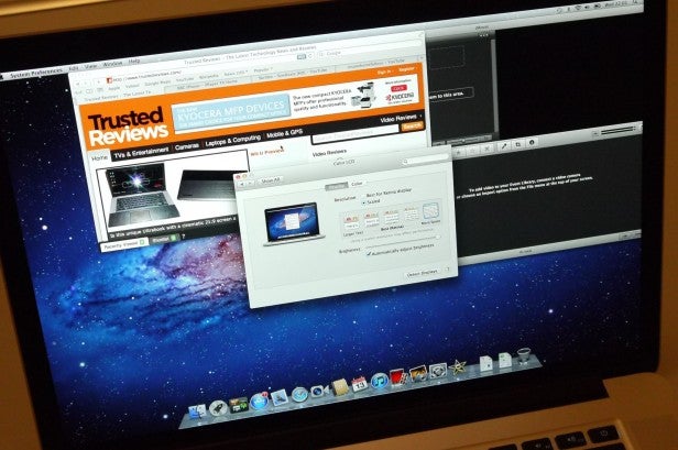 MacBook Pro 15-inch with Retina display and open applications.