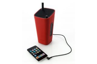 Red Sonoro CuboGo portable speaker with connected smartphone.
