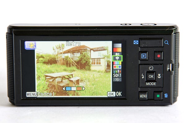 Pentax Optio LS465 camera displaying a photo on its LCD screen.