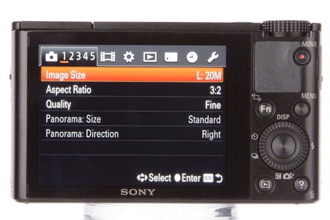 Sony Cyber-shot RX100 camera displaying menu options on screen.