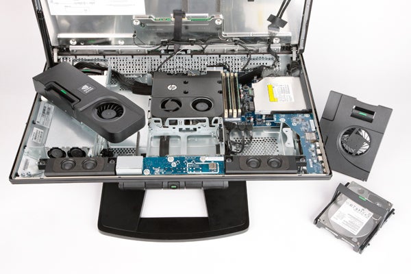 HP Z1 workstation opened showing internal components.HP Z1 all-in-one workstation with Windows display on screen.HP Z1 all-in-one workstation at an angled view.