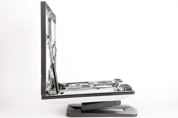 Internal components of an open HP Z1 workstation.HP Z1 workstation opened to show internal components.HP Z1 workstation opened showing internal components.HP Z1 all-in-one workstation with Windows display on screen.HP Z1 all-in-one workstation at an angled view.