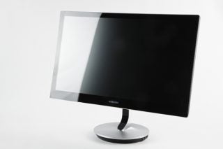 Samsung Series 9 S27B970D monitor on white background.