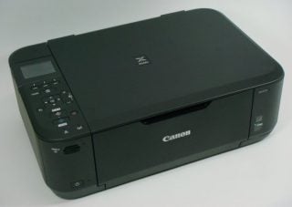 Canon PIXMA MG4250 all-in-one printer on a white surface.