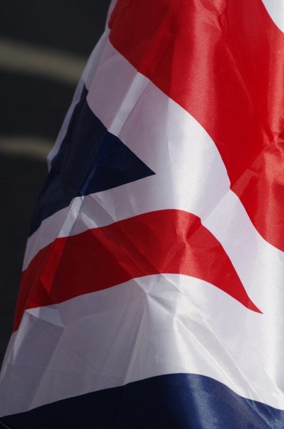 Close-up of the Union Jack flag fluttering in the wind.
