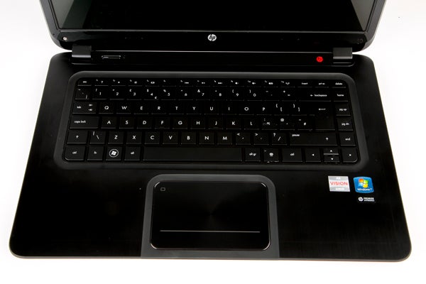 HP Envy 6-1006ea laptop with open screen displaying wallpaper.HP Envy 6-1006ea laptop with open lid displaying screenHP Envy 6-1006ea laptop red bottom casing with product labels.HP Envy 6-1006ea laptop keyboard and touchpad close-up.HP Envy 6-1006ea laptop closed on white background.Hand holding HP Envy 6-1006ea laptop at an angle showing ports.Close-up of HP Envy 6-1006ea laptop keyboard and side ports.