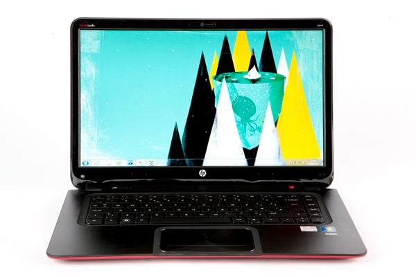 HP Envy 6-1006ea laptop with open screen displaying wallpaper.HP Envy 6-1006ea laptop with open lid displaying screenHP Envy 6-1006ea laptop red bottom casing with product labels.HP Envy 6-1006ea laptop closed on white background.Hand holding HP Envy 6-1006ea laptop at an angle showing ports.Close-up of HP Envy 6-1006ea laptop keyboard and side ports.