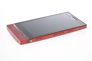 Sony Xperia P smartphone in red on white background