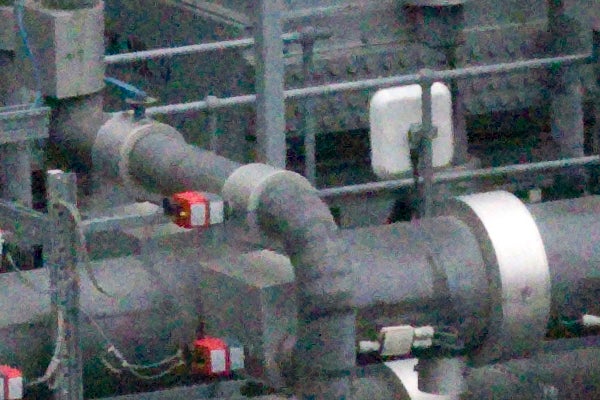 image of industrial pipes, due to camera shake.