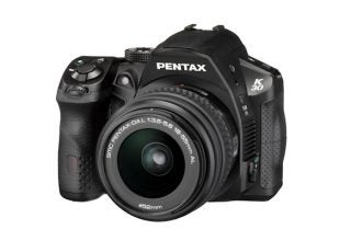 Pentax K-30 DSLR camera with 18-55mm lens.
