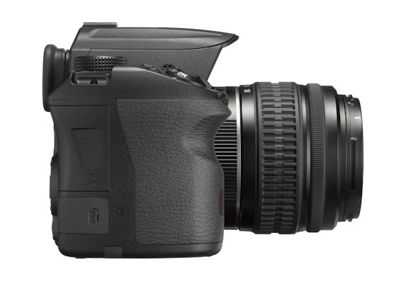 Side view of a Pentax K-30 DSLR camera with lens.
