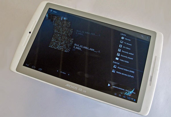 Archos 101 XS tablet displaying media library screen.