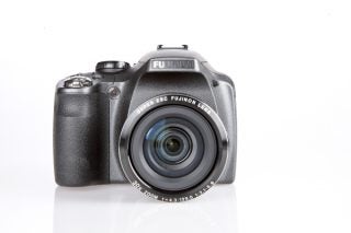 Fujifilm FinePix SL300 digital camera on white background.