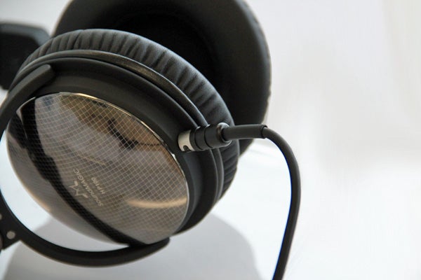 Close-up of SoundMagic HP100 headphones side view.