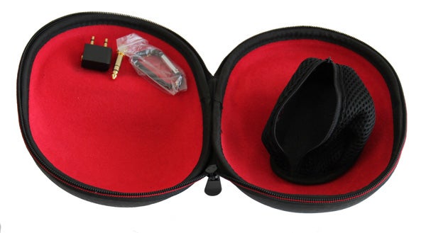SoundMagic HP100 headphones case with accessories.