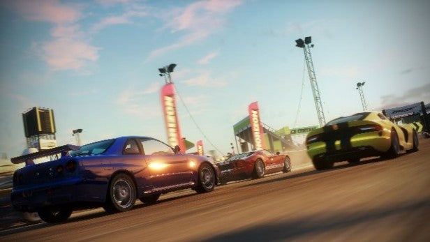 Sports cars racing in Forza Horizon game.