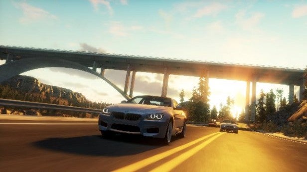 BMW driving on a highway in Forza Horizon at sunset.