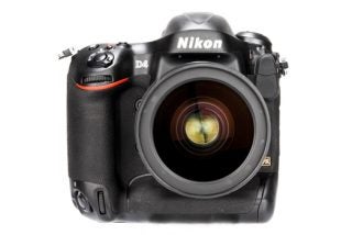 Nikon D4 DSLR camera front view with lens.