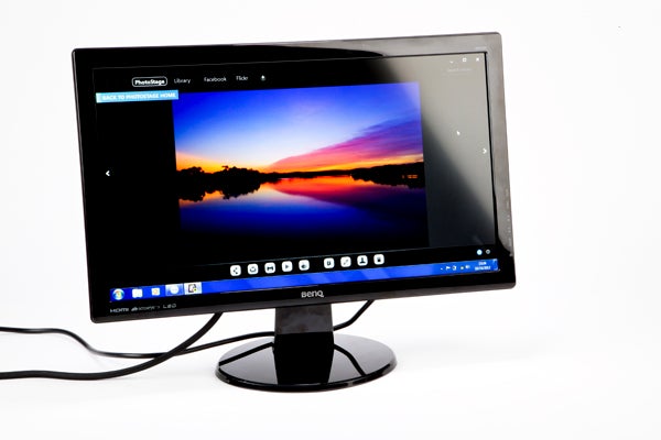 BenQ GW2250HM monitor displaying a colorful sunset wallpaper.