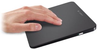 Hand using Logitech T650 wireless touchpad.