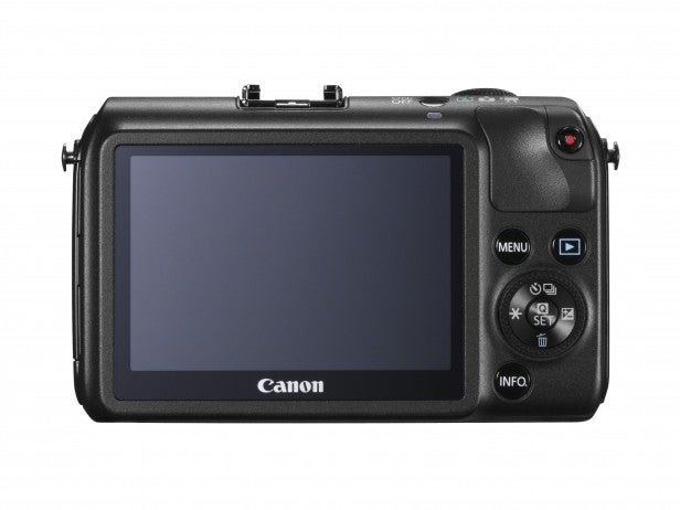 Rear view of Canon EOS M camera showing LCD screen and buttons.