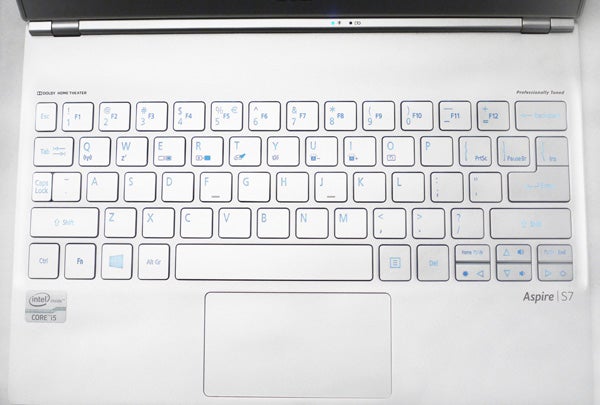 Close-up of Acer Aspire S7 laptop keyboard and touchpad.