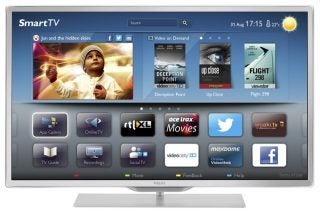 Philips 46PFL9707 Smart TV displaying colorful interface and apps