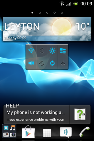 Sony Xperia Tipo smartphone displaying home screen and help message.