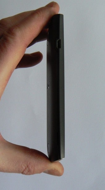 Side view of Acer CloudMobile S500 held in hand.