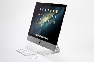 Apple iMac 27-inch 2012 model with wireless keyboard.