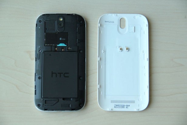 HTC One SV smartphone disassembled into two parts.Close-up of HTC One SV's back cover showing 4G LTE logo.