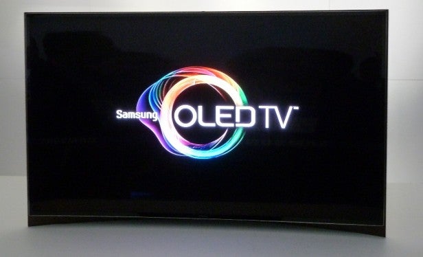 Samsung 55-inch Curved OLED TV displaying vibrant logo screen.