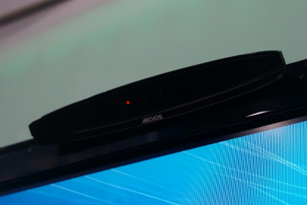 Archos TV Connect device on top of a television screen.