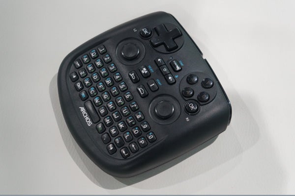Black Archos TV Connect controller with keyboard and buttons.