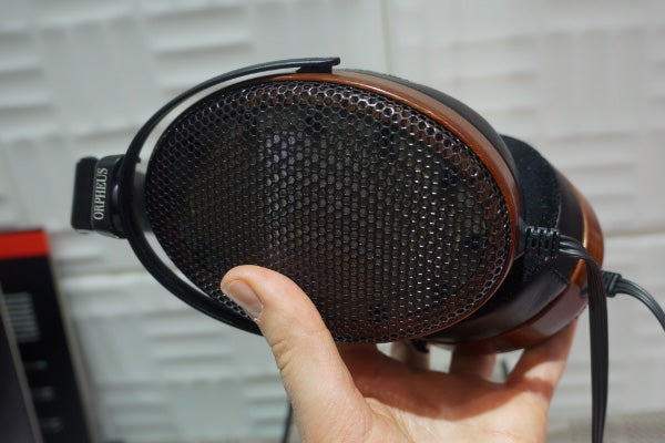 Close-up of Sennheiser Orpheus HE 90 headphones in hand.