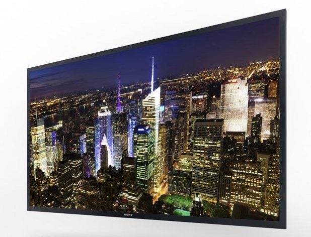 Sony 4K OLED TV displaying vibrant nighttime cityscape.