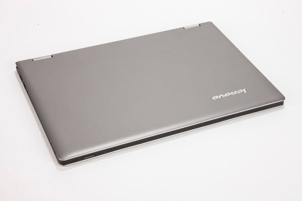 Lenovo IdeaPad Yoga 13 laptop closed on white background.