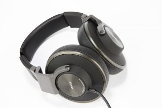 AKG K550 closed-back reference headphones on white background.