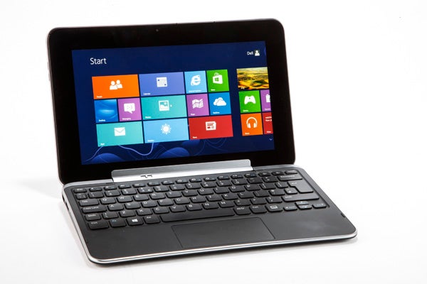 Dell XPS 10 tablet with keyboard dock and Windows interface.
