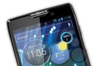 Close-up of Motorola Razr HD smartphone displaying screen icons.