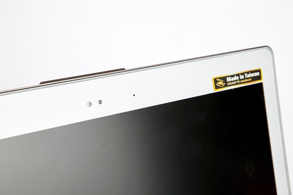 Close-up of Gigabyte U2442N laptop's webcam and sticker.