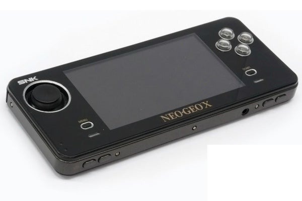 Neo Geo X Gold handheld gaming console on white background.