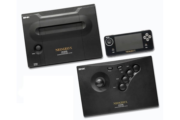 Neo Geo X Gold console, handheld, and joystick on white background.