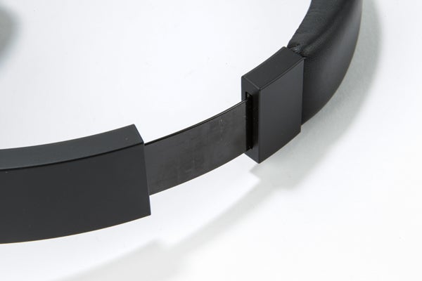 Close-up of Onkyo ES-HF300 headphone's headband and hinge.