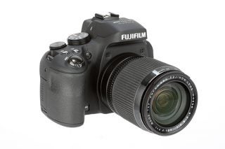 Fujifilm HS50 EXR bridge camera with lens extended.