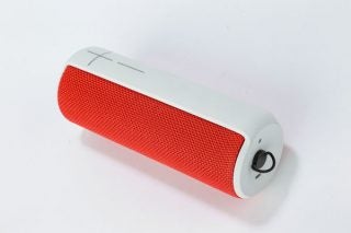 Ultimate Ears UE Boom wireless speaker in red on white background.