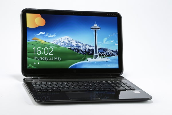 HP Pavilion Touchsmart Sleekbook 15-b129ea with open screen showing desktop.