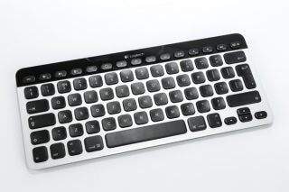 Logitech K811 Bluetooth keyboard on a white surface.
